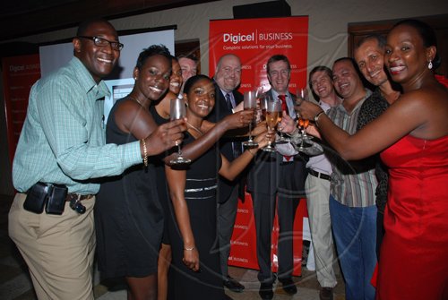 Janet Silvera Photo.

Digicel's CEO Mark Linehan (CENTRE) and his premium customers and staff from L- Dwayne Bennett, Tshani Jaja, Jacqueline Burrell-Clarke, Trisha Thompson, Niall Sheehy, Bryan Sklar, Adam Stewart, Ian Dear, Glenn Lawrence and Joy Clark.