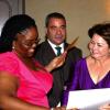 Winston Sill / Freelance Photographer
Monique Long (left) is delighted to receive her first place award for the Professor Juan Bosch Short Story, in honour of the late politician and short story writer. Dominican Republic Ambassador Filomena Navarro (right) presents Long with the award while Avelino Stanley, president of the jury that judged the entries, looks on. The presentation was made at the Gala Awards at King's House, Hope Road on Tuesday June 30, 2009.