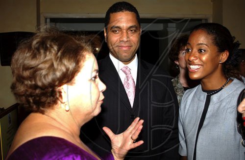 Winston Sill / Freelance Photographer
Dominican Republic Ambassador to Jamaica Filomena Navarro (left) chats with Curtis McDowell of JMMB BDI America and a bright-eyed Imani Duncan, JMMB group marketing manager .

presents the Professor Juan Bosch Short Story Gala Awards, in celebrating his centenary, held at King's House Hope Road on Tuesday June 30, 2009.
