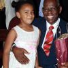 Colin Hamilton/freelance photographer
Dr  Gilbert Allen gets a special birthday hug from his grand daughter ??? at the launch of the trust.

***************************************************************************and Georgia Allen Educational Trust launch at Kings House on Thursday March 25, 2010.