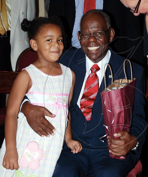 Colin Hamilton/freelance photographer
Dr  Gilbert Allen gets a special birthday hug from his grand daughter ??? at the launch of the trust.

***************************************************************************and Georgia Allen Educational Trust launch at Kings House on Thursday March 25, 2010.