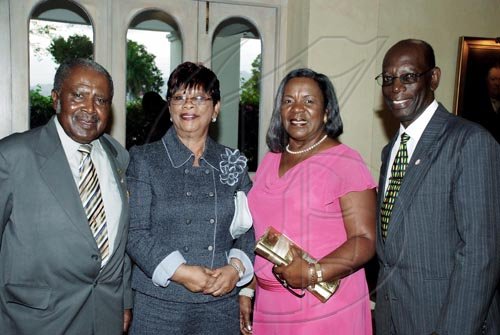 Colin Hamilton/freelance photographer
From left: Derrick Sinclair, Sylvia Lyn, ???? Sinclair and Ivan Green, of Manchester, smile for the social pages.

**************************************************************************The Gilbert and Georgia Allen Educational Trust launch at Kings House on Thursday March 25, 2010.