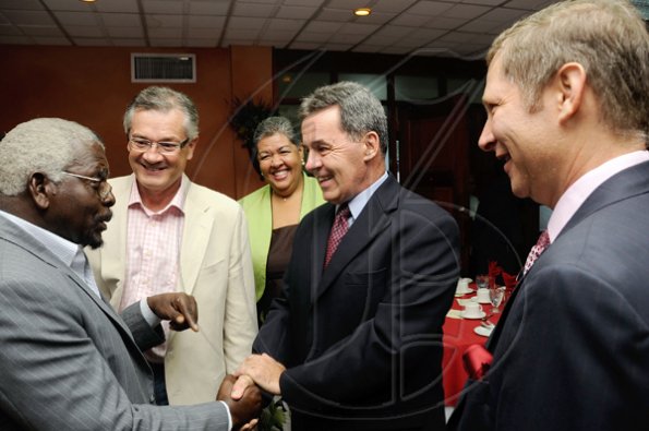 Rudolph Brown/Photographer
Pearnel Charles, (left) Minister of Labour and Social Security greets from right Bruce Bowen, President and CEO of Scotiabank, Stephen Hallihan, High Commissioner of Canada to Jamaica, Aloun Ndombet Assamba, Alumni and Attorney at Law, Hemi Mitic, labour Relations Consultant member CCELD Steering Committee at Scotiabank and CCELD launches Caribbean Canada Emerging Leaders' Dialogue, CCLED Conference 2011 at Courtleigh Hotel in New Kingston on Tuesday, August 17-2010.