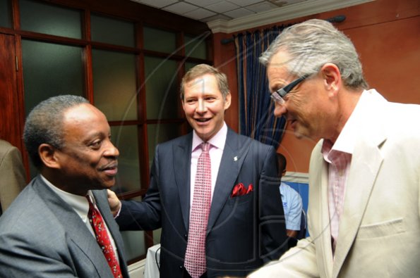 Rudolph Brown/Photographer
Milton Samuda , (left) president of the Jamaica Chamber of Commerce ( JCC) greets Bruce Bowen, (centre) President and CEO of Scotiabank and Hemi Mitic, (right) Labour Relations Consultant member CCELD Steering Committee at Scotiabank and CCELD launches Caribbean Canada Emerging Leaders' Dialogue, CCLED Conference 2011 at Courtleigh Hotel in New Kingston on Tuesday, August 17-2010.