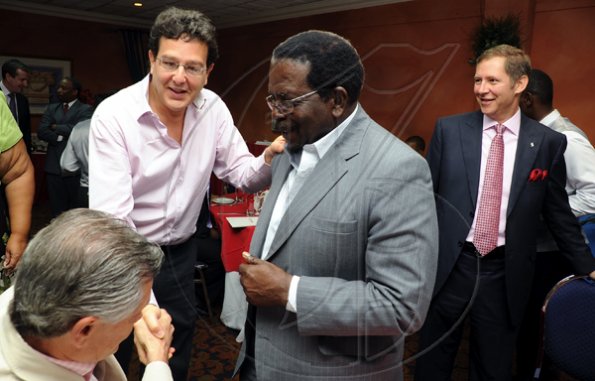 Rudolph Brown/Photographer
Joseph M. Matalon (second left)), president of the Private Sector Organisation of Jamaica (PSOJ), greets from left Hemi Mitic, labour Relations Consultant member CCELD Steering Committee, Pearnel Charles, Minister of Labour and Social Security and Bruce Bowen, President and CEO of Scotiabank, at Scotiabank and CCELD launches Caribbean Canada Emerging Leaders' Dialogue, CCLED Conference 2011 at Courtleigh Hotel in New Kingston on Tuesday, August 17-2010.