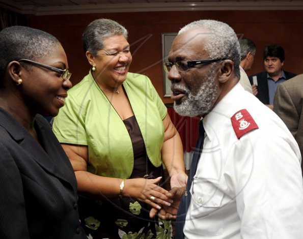Rudolph Brown/Photographer
Joylene Griffiths Irving, (left) Director, Public and Corporate Affairs chat with Major Stanley Griffin, (right) and Aloun Ndombet Assamba, Alumni and Attorney at Law at Scotiabank and CCELD launches Caribbean Canada Emerging Leaders' Dialogue, CCLED Conference 2011 at Courtleigh Hotel in New Kingston on Tuesday, August 17-2010.