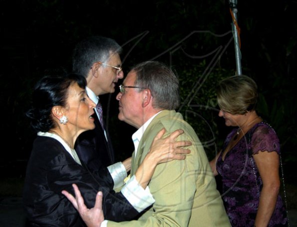 Winston Sill / Freelance Photographer
Russian Ambassador Victor Zotin (second right) and wife Olga (right) were out to celebrate Europe Day with EU boss Ambassador Marco Mazzocchi Alemanni and wife Fiela.

 Mazzocchi Alemanni host Europe Day Reception, held at Hyperion Avenue, Jacks Hill on Wednesday night May 12, 2010.