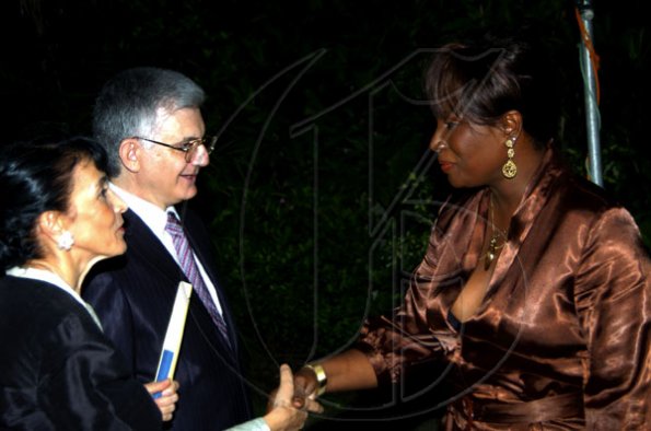 Winston Sill / Freelance Photographer
Head of the European Union delegation Ambassador Marco Mazzocchi Alemanni and wife Fiela greet the still beautiful Joan McDonald.

 Mazzocchi Alemanni host Europe Day Reception, held at Hyperion Avenue, Jacks Hill on Wednesday night May 12, 2010.
