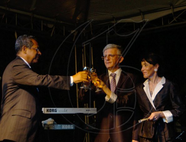 Winston Sill / Freelance Photographer
Deputy Prime Minister Dr Ken Baugh (left) toasts Europe Day with European Union head Ambassador Marco Mazzocchi Alemanni and wife Fiela Mazzocchi Alemanni at the Europe Day Reception, held at Hyperion Avenue, Jacks Hill on Wednesday night May 12, 2010.