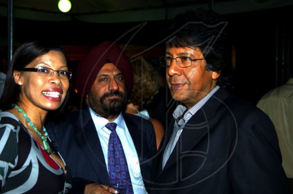 Winston Sill / Freelance Photographer
Indian High Commissioner Mohinder Grover (centre) chills with Kenny Benjamin and Allison Peart.

Ambassador Marco Mazzocchi Alemanni and Fiela Mazzocchi Alemanni host Europe Day Reception, held at Hyperion Avenue, Jacks Hill on Wednesday night May 12, 2010.