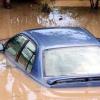 Norman Grindley/Chief Photographer
This partially submerged car was one of many vehicles rendered immobile by flood waters in Milk River, Clarendon, on Monday.

 Clarendon after heavy rain May, 25, 2009.