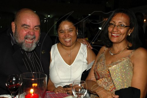 Colin Hamilton/freelance photographer
Journalist Philip Mascoll (L) has a good laugh with daughter Keisha Mascoll - Marketing Manager VMBS (C) and Maxene Johnson during the Opening Ceremony of the Inaugural Future Leaders Jamaican Diaspora Conference at the Mona Visitors Lodge on Tuesday August 4, 2009.