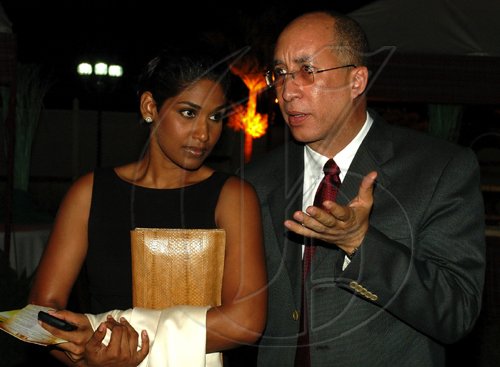 Colin Hamilton/freelance photographer
Delano Franklyn gesticulates while in conversation with Lisa Hanna during the Opening Ceremony of the Inaugural Future Leaders Jamaican Diaspora Conference at the Mona Visitors Lodge on Tuesday August 4, 2009.