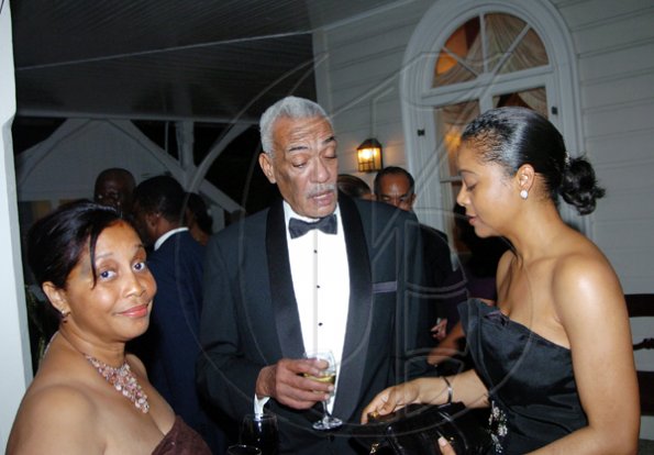 Winston Sill/Freelance Photographer
Justice Howard Cooke and wife Heather (left) lyme with Senator Marlene Malahoo Forte.

Governor General's dinner held in honour of the President of Tanzania, Jakaya Mrisho Kikwete at Kings House on Wednesday November 25, 2009.