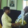 Colin Gager, mayor of Falmouth (right) makes a presentation to Her Excellency the Most Honourable Lady Allen.