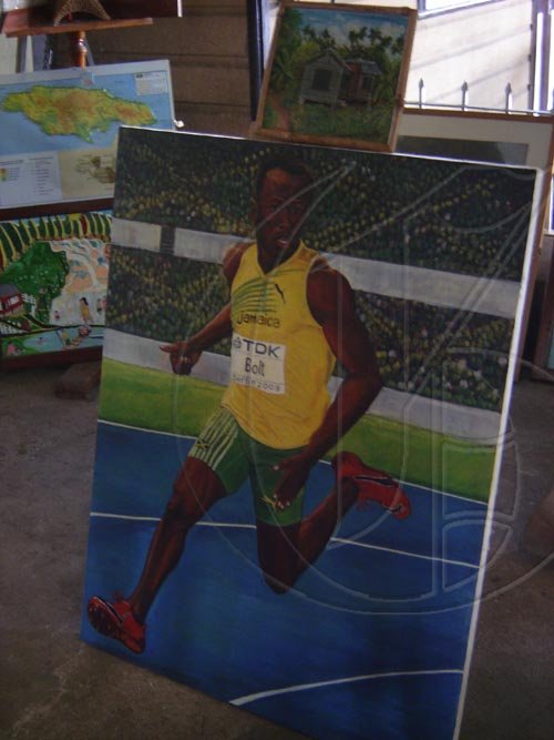 Usain Bolt's portrait is one of the many cultural items on display in the Albert George Market and Shopping Centre in Falmouth, Trelawny.