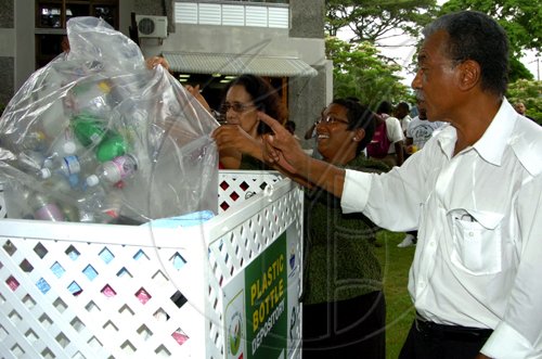 Winston Sill / Freelance Photographer
Scotiabank Group hand over "Receptacles to the University of the West Indies (UWI) Plastic Bottle Recycling Project, and Unveiling of Scotiabank Goes Green",  held at the UWI Centre for Environmental Management, Mona Campus on Tuesday May 18, 2010.  Here are Prof. Elizabeth Thomas Hope (left), Director, Centre for Environmental Management, UWI; Heather Goldson (centre), Senior Vice President, Marketing, Public and Corporate Affairs, Scotiabank; and D'Arcey Crooks (right), Director, Protect the Environment Trust.