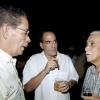 Winston Sill / Freelance Photographer
From left:; Douglas Vaz;  cigarman Joseph Adduci and Col. Trevor MacMillan in discussion at Guardsman Group Limited host Christmas party.

***********************************************************************, Held at their Head Office, Old Hope Road on Friday December 11, 2009. Here are Douglas Vaz (left); the cigarman Joseph Adduci (centre); and Col. Trevor MacMillan (right).