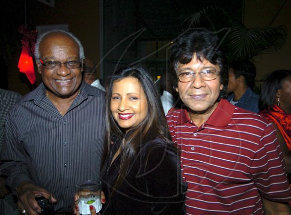 Winston Sill / Freelance Photographer
Guardsman Group Limited host Christmas Party, Held at their Head Office, Old Hope Road on Friday December 11, 2009. Here are Lester Spaulding (left); Sheila Benjamin-McNeill (centre); and Kenny Benjamin (right).