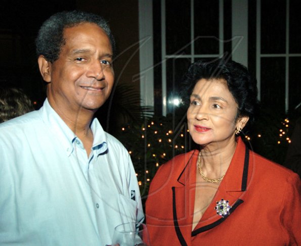 Winston Sill / Freelance Photographer
 Lt. John McFarlane spends time with Valerie Juggan-Brown.


************************************************************************** (right).Guardsman Group Limited host Christmas Party, Held at their Head Office, Old Hope Road on Friday December 11, 2009. Here are Lt. John McFarlane (left); and Valerie Juggan-Brown (right).