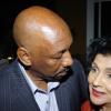Winston Sill / Freelance Photographer
Health Minister Rudyard Spencer, seems to be tending to Guardsman's chief executive officer Valerie Juggan-Brown.

************************************************************* 
Guardsman Group Limited host Christmas Party, Held at their Head Office, Old Hope Road on Friday December 11, 2009. (right).