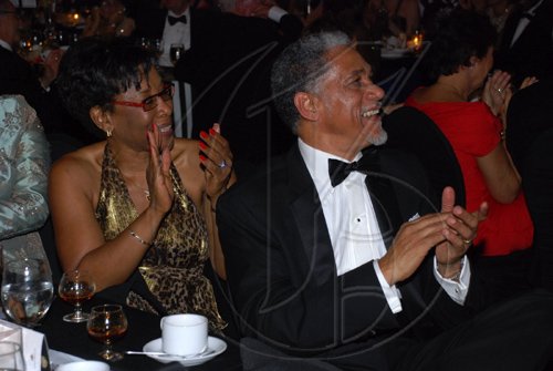 Colin Hamilton/Freelance Photographer
PSOJ Hall of Fame on December 7, 2010 - DR Claudette Cooke and husband Maj. Richard Cooke applaud the night's events.