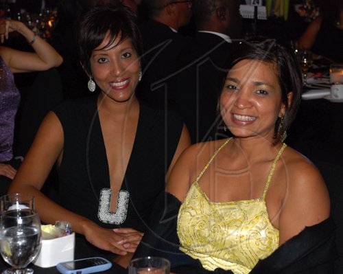 Colin Hamilton/Freelance Photographer
PSOJ Hall of Fame on December 7, 2010 - At left, Nasma Mohammed and Denise Williams (PR Manager - Flow)