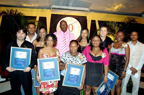 10th Year Awardees
Back row (from left:) Barrington James, Natalie McDonald, N’Kem Gordom, Natalie McDonald and Matthew Deleo
Front row (from left): Stephen Hugh, Cecile Cameron, Gwendolyn Rowe-Ledgister, Kiashana Stewart, Victoria Francis and Kofi Foster.