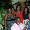 N’Kem Gordon showing off his award. Other Intcomex employees are (from left): Keisha Lawla, Janice Morris and Suzette Hooper.