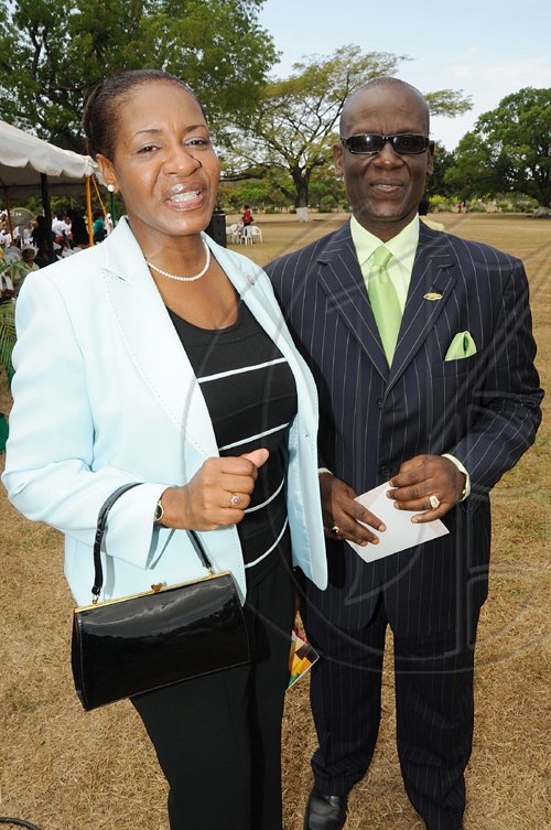 Rudolph Brown/Chief Photographer
Mayor of Kingston, Desmond Mckenzie chat with Andrea Franisat the Independence Day Ceremony at Kings House on Thursday, August 6-2009