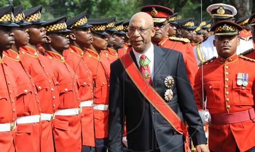 Rudolph Brown/Chief Photographer
Sir Patrick Allen, Governor General, Inpecting the Guard of Honour at the Independence Day Ceremony at Kings House on Thursday, August 6-2009