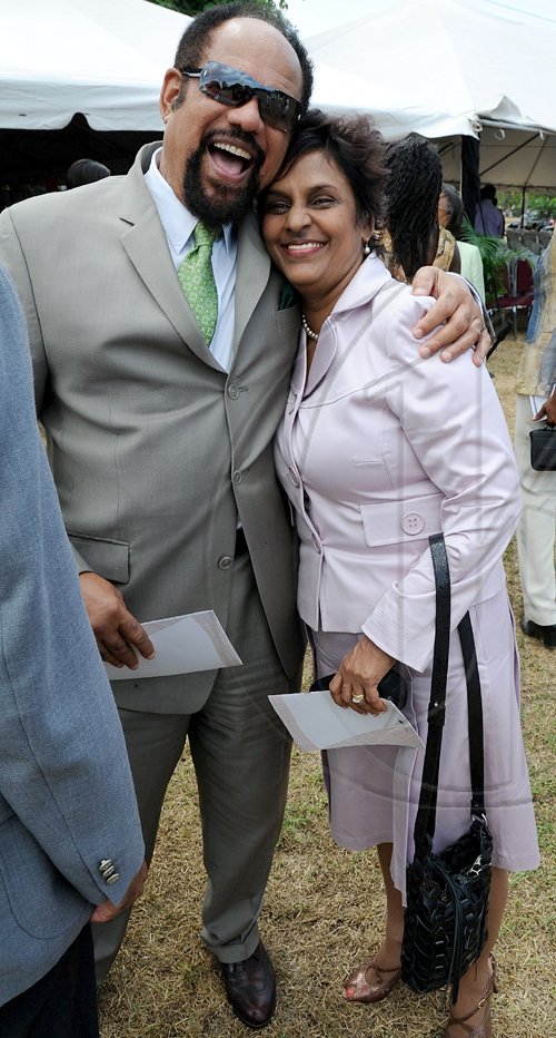 Rudolph Brown/Chief Photographer
Oswald Harding shares a joke with Group Managing Director of the Petroleum Corporation of Jamaica (PCJ), Dr.Ruth at the Independence Day Ceremony at Kings House on Thursday, August 6-2009