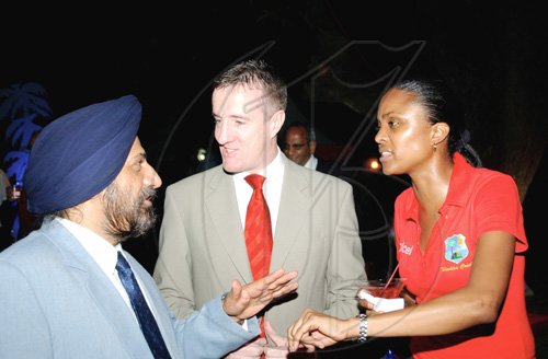 Winston Sill / Freelance Photographer
Indian High Commissioner Mohinder Singh Grover (left)  and Digicel Jamaica Chief Executive Officer, Mark Linehan and Digicel business' Trisha Thompson in a little chit-chat at Wednesday's reception for  the cricketers,  at India House, East King's House Road, StAndrew.


************************************************************************ on Wednesday June 24, 2009.