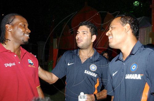 Winston Sill / Freelance Photographer
Three of world cricket's big hitters (from left) West Indies captain Chris Gayle, Yuvraj Singh and Yusuf Pathan may be planning to hit big sixes in the series.

***************************************************************************************************

 Indian High Commissioner and Digicel host Reception for  Cricketers, held at India House, East King's House Road on Wednesday June 24, 2009.