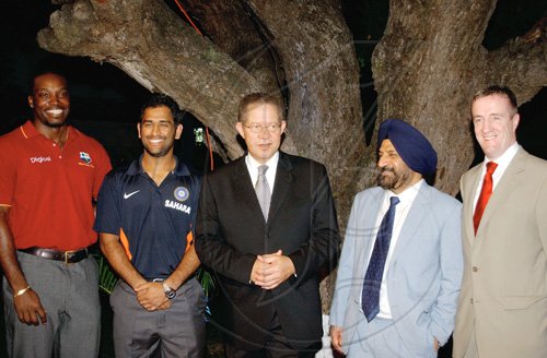 Winston Sill / Freelance Photographer
Prime Minister Bruce Golding (centre), jokes with (from left) West Indies captain Chris Gayle, Indian captain Mahendra Singh Dhoni, Indian High Commissioner Mohinder Singh Grover and Digicel Jamaica CEO Mark Linehan.

*************************************************************************************************Indian High Commissioner and Digicel host Reception for  Cricketers, held at India House, East King's House Road on Wednesday June 24, 2009.