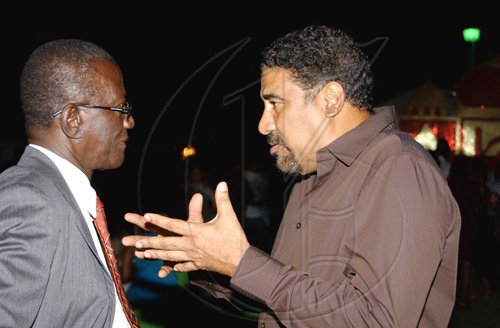 Winston Sill / Freelance Photographer
Dr Wykeham McNeill (right) opposition spokesman on tourism makes a point to National Security Minister Dwight Nelson at the Indian High Commissioner and Digicel reception for cricketers, held at India House, East King's House Road on Wednesday June 24, 2009.