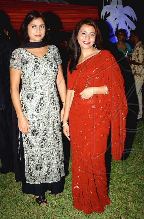 Winston Sill / Freelance Photographer
Samina Malik (left) and Sonya Alam are pictures of sheer elegance.

Indian High Commissioner and Digicel host Reception for  Cricketers, held at India House, East King's House Road on Wednesday June 24, 2009.