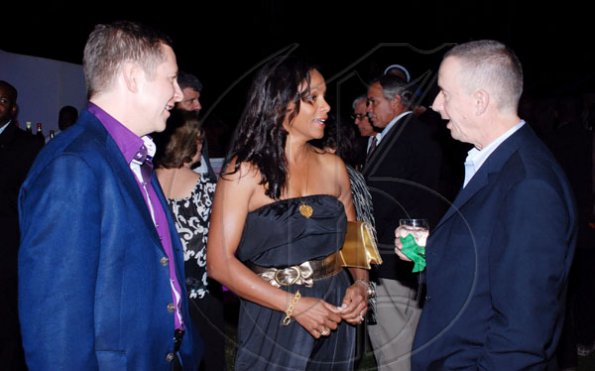Colin Hamilton/Freelance Photogapher
Scotiabank's president, Bruce Bowen (left) and his lovely wife, Suzann were being entertained by Paul Hansworth from 1876 Wine.

********************************************
JAAA Awards at Jamaica House on Saturday January 8, 2010.