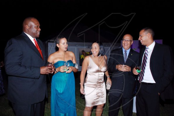 Colin Hamilton/Freelance Photogapher
With a drink and good company, it is  no surprise that Andrew Price (left) his wife, Nicole (second left), Shelly-Ann Curran (centre), Robert Stephens (second right) and son, Sean are all having a grand time at the Golden Cleats Awards.




JAAA Awards at Jamaica House on Saturday January 8, 2010.