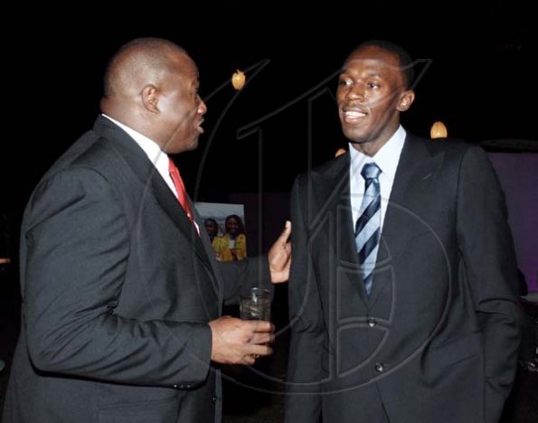 Colin Hamilton/Freelance Photogapher
Wray and Nephew's, Andrew Price (left), chats with the big man himself, Hon Usain Bolt.

********************************************************
JAAA Awards at Jamaica House on Saturday January 8, 2010.