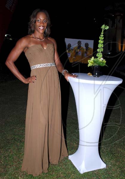Colin Hamilton/Freelance Photogapher
World Champion gold medalist, Brigette Foster-Hylton wore a stunning brown Ralph Lauren dress to the Inaugural Golden Cleats Awards in which she was nominated as one of the contestants for female athlete of the year. Her  corset top dress was made even more dazzling with its lovely stones belt and a small V-cut that showed off a little cleavage  and made her looked quite elegant. Foster-Hylton's dress was bought in the United States of America and Ralph Lauren happens to be one of her favourite designer but she also admits that she likes BCGC, and Sax Fifth Avenue. 


JAAA Awards at Jamaica House on Saturday January 8, 2010.