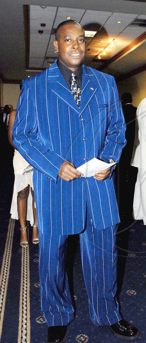 Colin Hamilton/freelance photographer
Blue, blue,  Inspector Gary McKenzie's world is blue as he poses for our camera at the Jamaica Constabulary Force awards dinner on Saturday.

*********************************************************************** September 5, 2009.