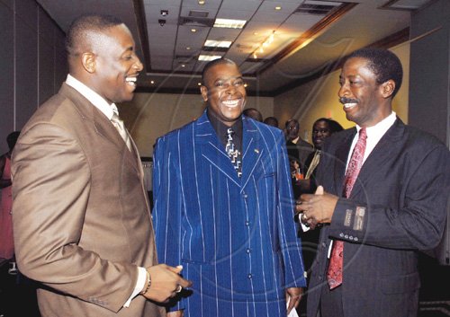 Colin Hamilton/freelance photographer
DSP Wayne Cameron; Insp.Gary McKenzie; Sup. Radcliffe Lewis socialise before the awards during the Jamaica constabulary Force Awards Dinner at the Pegasus Hotel on Saturday September 5, 2009.