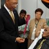 Ian Allen/Staff Photographer
Sir patrick Allen left, Governor General along with Olilvia Grange centre, Minister of Youth, Sports and Culture presented with a Musgrave Gold Medal and citation to Wycliffe Bennett at an award ceremony at the University of the West Indies Hospital. Wycliffe Bennett who has been ailing for some time was also visited by  scores of admirers who attended the ceremony. Looking on is his wife Dr. Hazel Bennett.