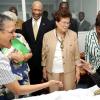 Ian Allen/Staff Photographer
Wycliffe Bennett (right) shows his delight when Fae Ellington (left) visits during The Institute of Jamaica's Musgrave Medal award ceremony held at the University of the West Indies Hospital. Bennett was presented with a Gold Medal and a citation by Governor General Sir Patrick Allen (third left) and Sports Minister Olivia Grange for his contribution to the development of the arts in Jamaica. Looking on are Hazel Bennett (centre) and Jean Smith (partially hidden).