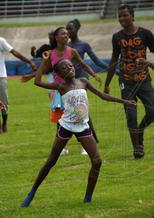 Ricardo Makyn/Satff Photographer.
Youngsters  making final preparations for the Independence Gala performance at the National Stadium on Thursday 5.8.2010.
