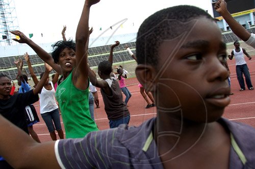 Ricardo Makyn/Satff Photographer.
Youngsters from the Tivoli Gardens Community making final preparations for the Independence Gala performance at the National Stadium on Thursday 5.8.2010.