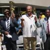 Contributed                                                                                                                                                                                                                                                          Jamaicans in Toronto participate in the flag raising
ceremony held on August 1 at Nathan Phillips Square, Toronto City Hall, to commemorate Jamaica’s Independence