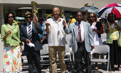 Contributed                                                                                                                                                                                                                                                          Jamaicans in Toronto participate in the flag raising
ceremony held on August 1 at Nathan Phillips Square, Toronto City Hall, to commemorate Jamaica’s Independence