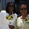 Contributed                                                                                                                                                                                                                                                          Jamaica’s High Commissioner to Canada, Her Excellency Sheila Sealy Monteith (left) and Regional Director for the Jamaica Tourist Board (JTB), Sandra Scott, proudly display miniature Jamaican flags at a flag raising ceremony held on August 1 at Nathan Phillips Square, Toronto City Hall, to
commemorate Jamaica’s Independence.